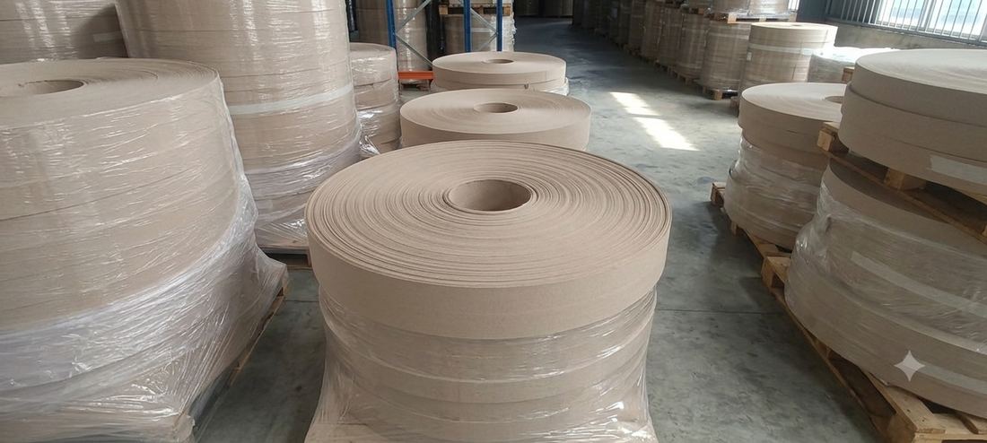 Stacked rolls of Technopaper greyboard in the mill warehouse